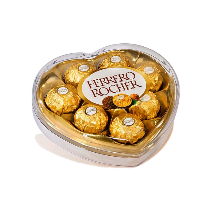 El Chocolate Ferrero Corazón es una caja de plástico en forma de corazón con ocho bombones envueltos en papel de oro, perfecta como regalo, que se muestra sobre un fondo blanco.